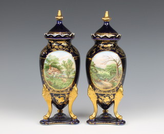 A pair of Sevres style gilt porcelain urns and covers with panelled decoration depicting country scenes, raised on cabriole supports with triform base, the bases marked 427/2726 24cm h  