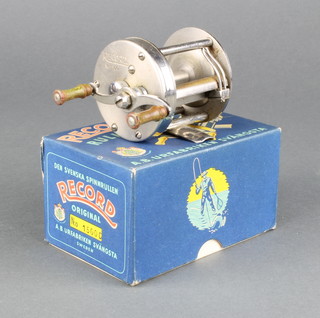 An ABU Record 1500 multiplier fishing reel in original box with parts list  