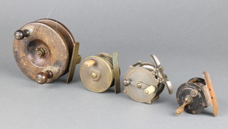 A Cone brass and wooden star back centre pin fishing reel, patent no. 24776 10cm (4cm chip to the rim) together with 3 early brass centre pin fishing reels 