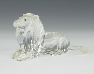 A Swarovski figure "Lion" No 185410 designed by Adi Stocker, contained in a fitted box 