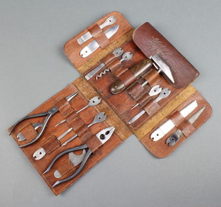 A German Electric Blosta pre 1952 multi-purpose tool kit DRGM design registration mark comprising knife, blade, corkscrew and file, together with 2 pairs of polished steel pliers, all contained in a leather carrying case
