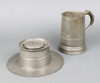 A 19th Century pewter capstan inkwell 8cm x 22cm diam. with associated china liner (slight scratching in places) together with a Victorian quart measure marked CB Imperial (old repair to handle)