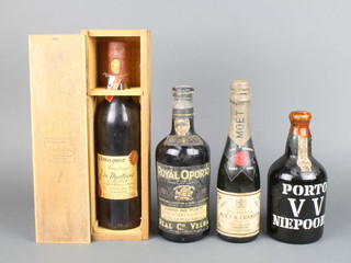 A bottle of J de Malliac Armagnac Hors d'age dated 1921, bottled by Reinhard & Co Ltd London, a half bottle of 1961 Moet & Chandon champagne, a bottle of 1970 Royal Oporto Dinho Do Porto 1970 vintage port and a bottle of EV Niepoort Porto  