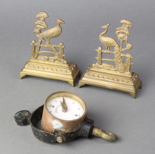 A pair of Victorian pierced gilt metal bookends decorated peacocks 4"h x 4"w together with a Meteorolog