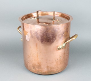 A large twin handled copper sauce pan complete with lid 32cm x 33cm the lid marked AP, polished 