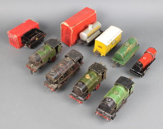 A Hornby 101 Type clockwork tank engine, a LNER Hornby tank engine Great Western Railway, do. Southern (missing a wheel), 1 other, a Hornby Type 20 clockwork locomotive together with a No.50 tender boxed and 3 items of rolling stock  