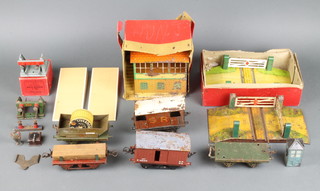 A Hornby signal box - boxed and corroded, a Hornby No.1 level crossing - boxed, 1 other level crossing and a brake van etc 