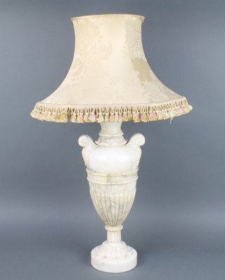 A carved white veined marble table lamp in the form of a twin handled urn 56cm h 