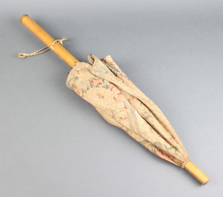 An Edwardian ladies parasol with bamboo shaft 69cm l 
