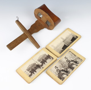 A stereoscopic viewer together with 22 unmarked slides including London and characters 