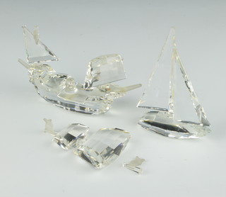 A Swarovski "Santa Maria" No 162882/7473000003, designed by Gabriele Stamey, contained in a fitted box, together with one other Swarovski sailing boat 