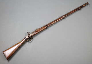 An Enfield 1853 three bar rifle musket, the tower lock with Royal Cypher, crown and VR marked 1858, complete with ram rod 
