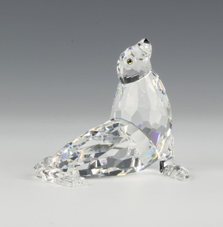 A Swarovski figure "Sea Lion Mother" No 679592/7661000007 designed by Mario Dilitz, contained in a fitted box  