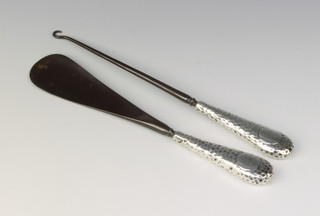 A Victorian silver button hook and shoe horn, London 1899
