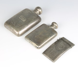 A silver hip flask London 1927 by Mappin & Webb 10cm, a silver hip flask Birmingham 1944 8cm and a silver card case with engine turned decoration London 1906 (marks rubbed) 200 grams