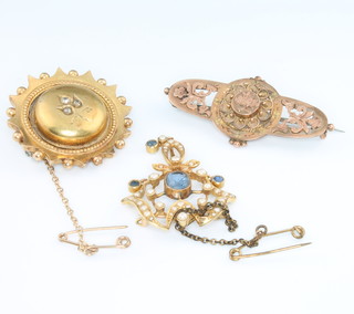 A Victorian gold etruscan style brooch, a do. and a seed pearl and gem set pendant brooch 