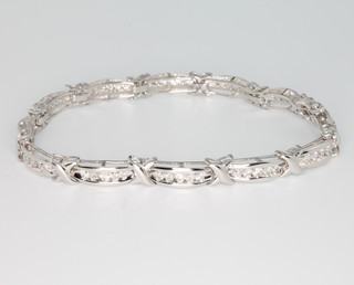 A 9ct white gold brilliant cut diamond set bracelet, approx 2.0ct. 80mm l