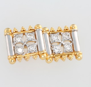 A pair of yellow and white gold diamond set earrings