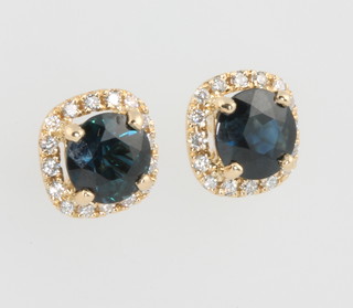A pair of 18ct yellow gold sapphire and diamond cluster ear studs, the sapphires approx 2.9ct, the diamonds approx 0.22ct
