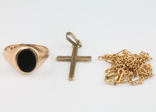 An 18ct yellow gold necklace 3.5grams, a 9ct gold cross and a 9ct yellow gold onyx signet ring size K 