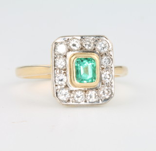 An Edwardian style 18ct yellow gold emerald and diamond rectangular ring size M 