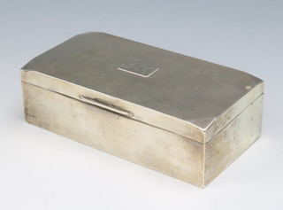 A rectangular silver engine turned cigarette box Birmingham 1957 5cm x 16cm x 7.5cm 