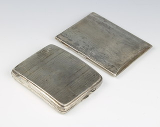 A silver engine turned cigarette case Birmingham 1942, an engine turned ditto 280 grams 