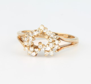 A 14ct yellow gold diamond set heart shaped ring size  L 