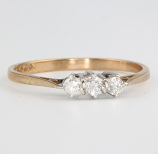 A 9ct yellow gold 3 stone diamond ring size Q 