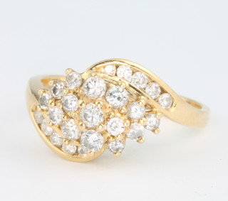 An 18ct yellow gold diamond whorl ring size M 1/2