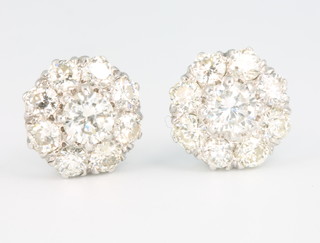 A pair of 18ct white gold and platinum diamond cluster ear studs, approx 2ct