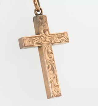 A 9ct yellow gold cross and chain 6.3grms