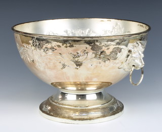 A silver plated repousse punch bowl with lion ring handles 32.5cm 