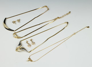 Four Christian Dior gilt necklaces and 2 pairs of paste earrings