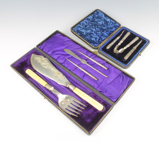 A pair of Edwardian silver plated cased fish servers, a ditto nut cracker set and 3 other items 