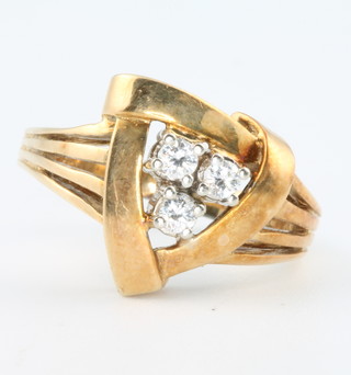 A 14ct yellow gold diamond set open dress ring size K 1/2
