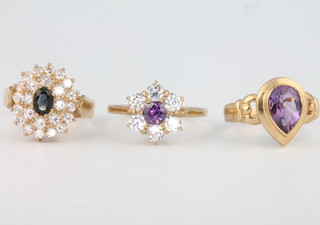 A 9ct yellow gold pear cut amethyst ring size P, 2 other gem set rings sizes O and Q 