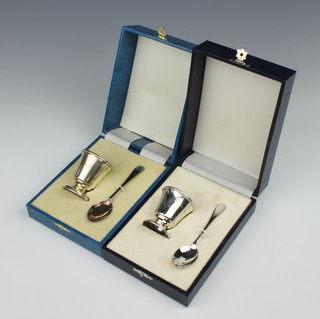Two cased silver egg cups and spoons Birmingham 1991 and 1995, 70 grams 