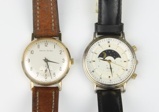 A gentleman's yellow cased Smith's astral wristwatch with seconds at 6 o'clock and a gilt cased moon face quartz ditto