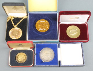 A silver philatelic medallion Birmingham 1982, a gilt do. 95 grams and 3 other medallions 