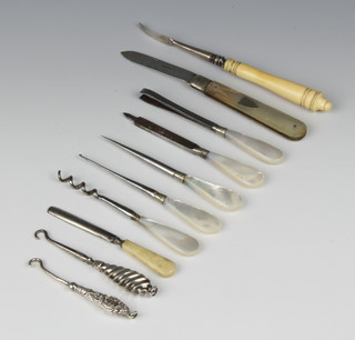 A silver and mother of pearl fruit knife, four mother of pearl handled manicure items and four others