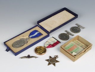 A Victorian Masonic charity jewel contained in a 15ct yellow gold mount, a silver ditto, a pin badge and a WWII trio to F/LT. J.V.MIDWINTER comprising 1939-45 star, defence medal and British war medal in original posting box