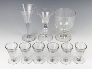 A 19th Century glass rummer engraved Charles Wright Whitby 1858, an 18th Century shaped wine glass with etched cypher marked Amen, a George V 1911 Coronation trumpet shaped wine glass the stem set a thruppence and 6 penny lick ice cream glasses 