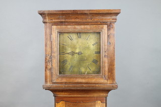 Cornelius Muzzell Horsham 1793-1799, a 30 hour singled handed longcase clock with 25cm square brass dial, engraved spandrels, the dial signed Corn. Muzzell Horsham, having a birdcage movement and striking on a bell, contained in an associated oak case 180cm high, complete with pendulum and weight 