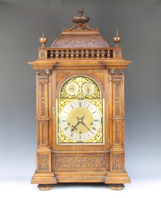 Winterhalder & Hofmeier Schwarzenbach, a 19th Century German chiming bracket clock striking on 2 gongs with 22cm arched brass dial, gilt spandrels, silent/chime dial and slow/fast dial with silver chapter ring and Roman numerals, contained in carved oak case, complete with pendulum and key,  87cm h x 46cm w x 26cm d