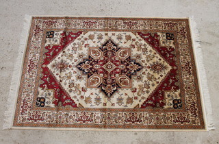 A white and red ground Belgian cotton Heriz style rug 190cm x 140cm 