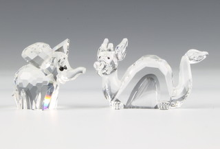 A Swarovski figure of an elephant 4cm together with a do. dragon (both boxed)