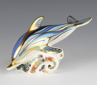 A Royal Crown Derby dolphin paperweight with gold stopper,  base marked MM11, boxed 