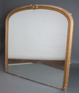 A Victorian arched shaped plate wall mirror contained in a decorative gilt frame with garland decoration 163cm x 162cm 