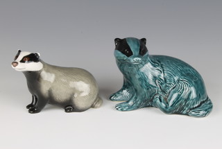 A John Beswick figure of a seated badger 8cm together with a blue glazed Poole Pottery do. 10cm 